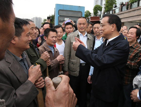 李克强：发展需“棒棒精神”