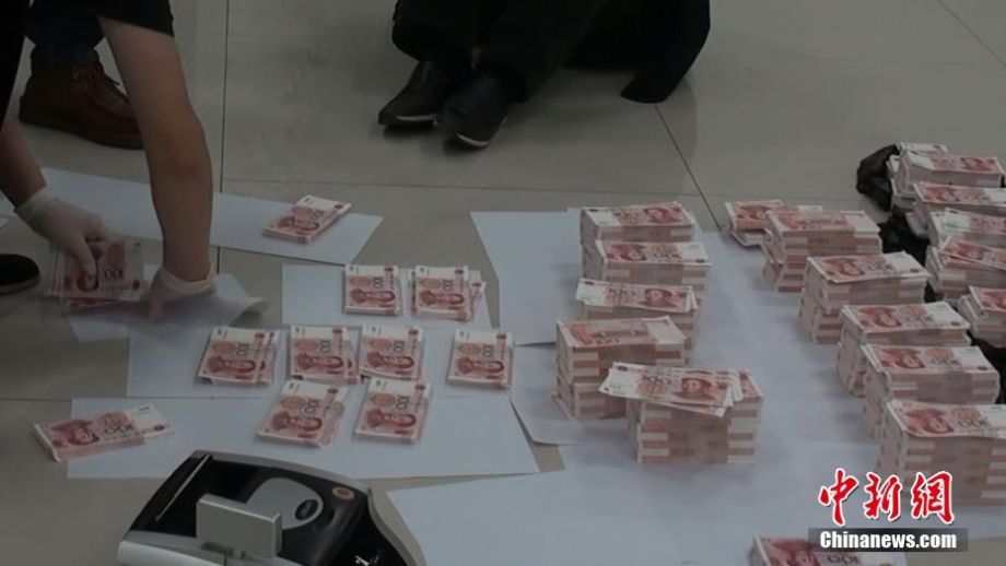 重庆警方破获特大假币案 缴获假人民币202万元（组图）