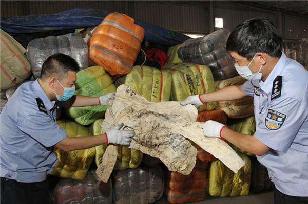 海关截获500吨韩国旧服装 有的来自太平间