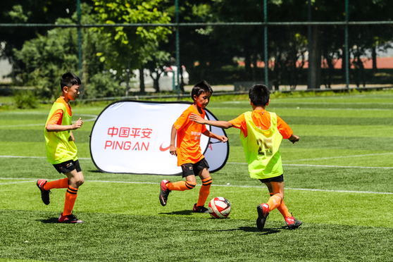 欢度“六一” 践行足球公益——“平安球童成长计划足球训练营”正式启动