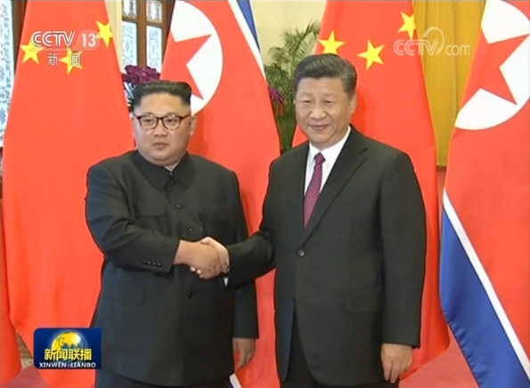 Xi Jinping held a ceremony to welcome Kim Jong -un to visit China and hold talks with him