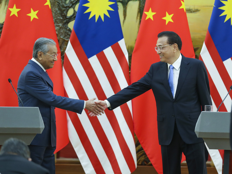李克强与马来西亚总理马哈蒂尔共同会见记者