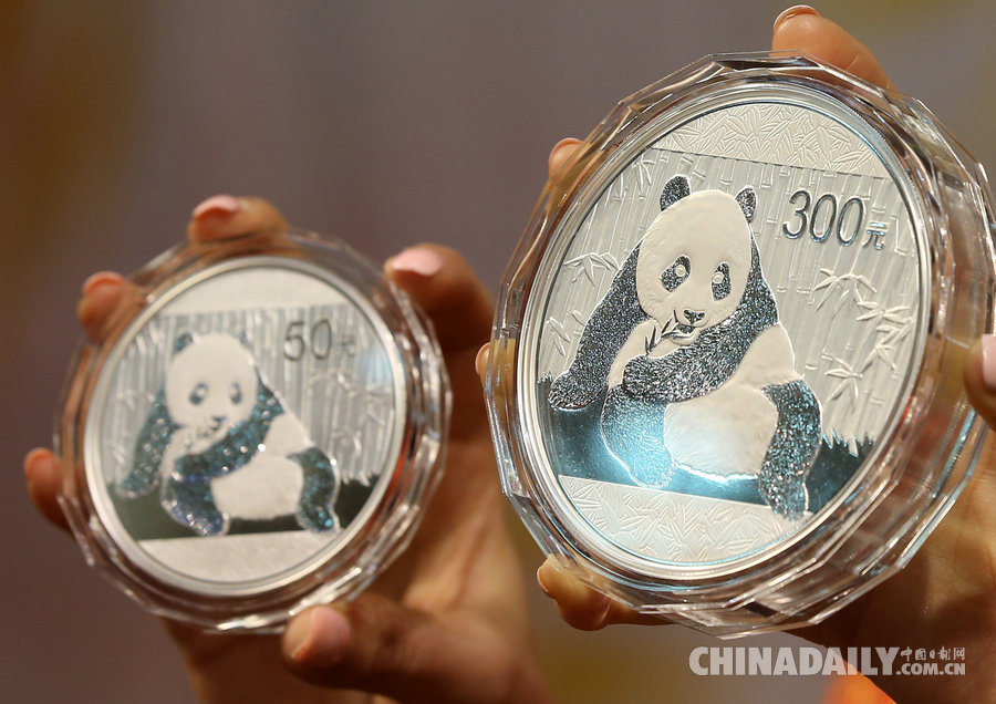韩国发行“熊猫币” 纪念两国抗日战争胜利70周年